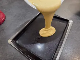 Étaler sur une plaque chemisée